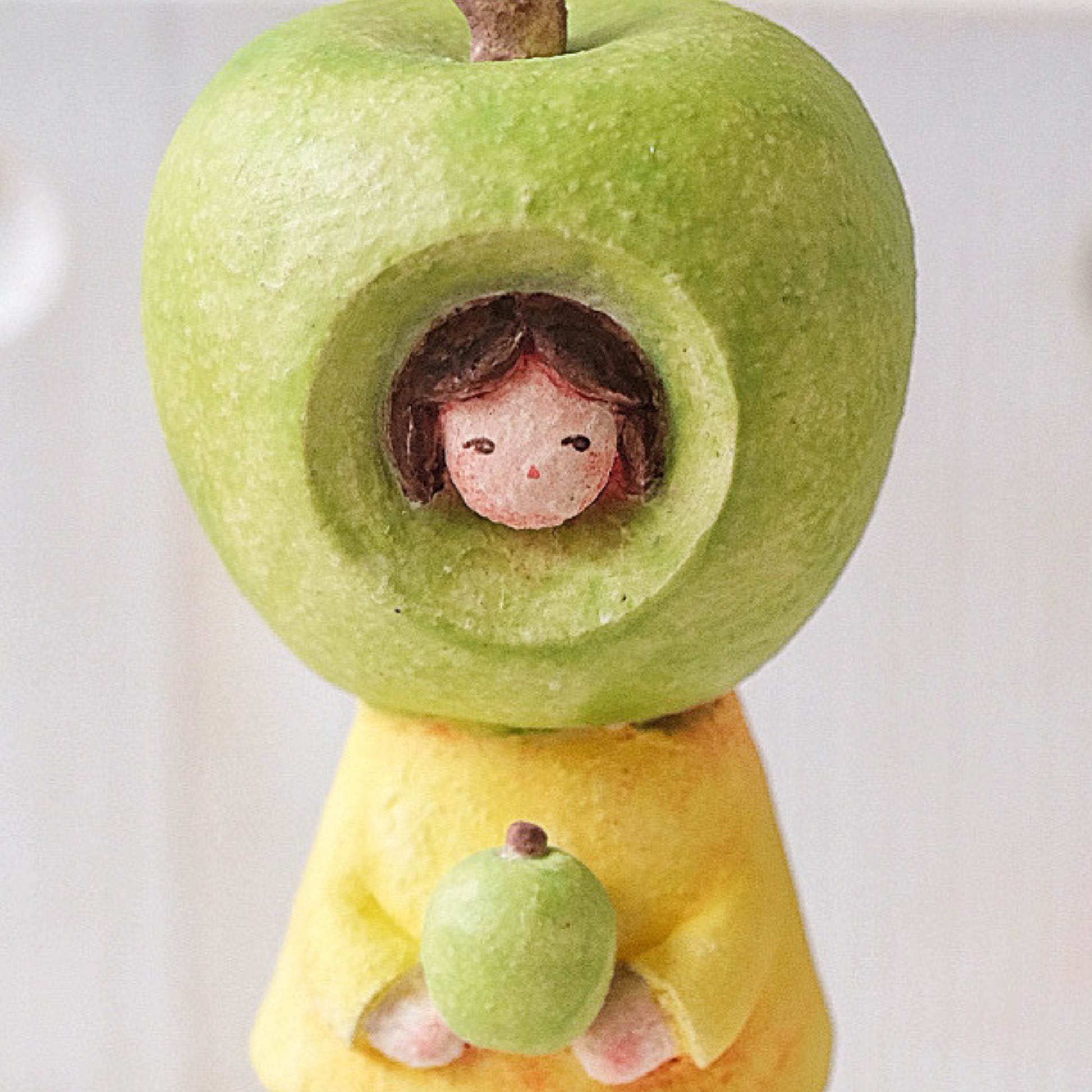 Ms. Apple in Green