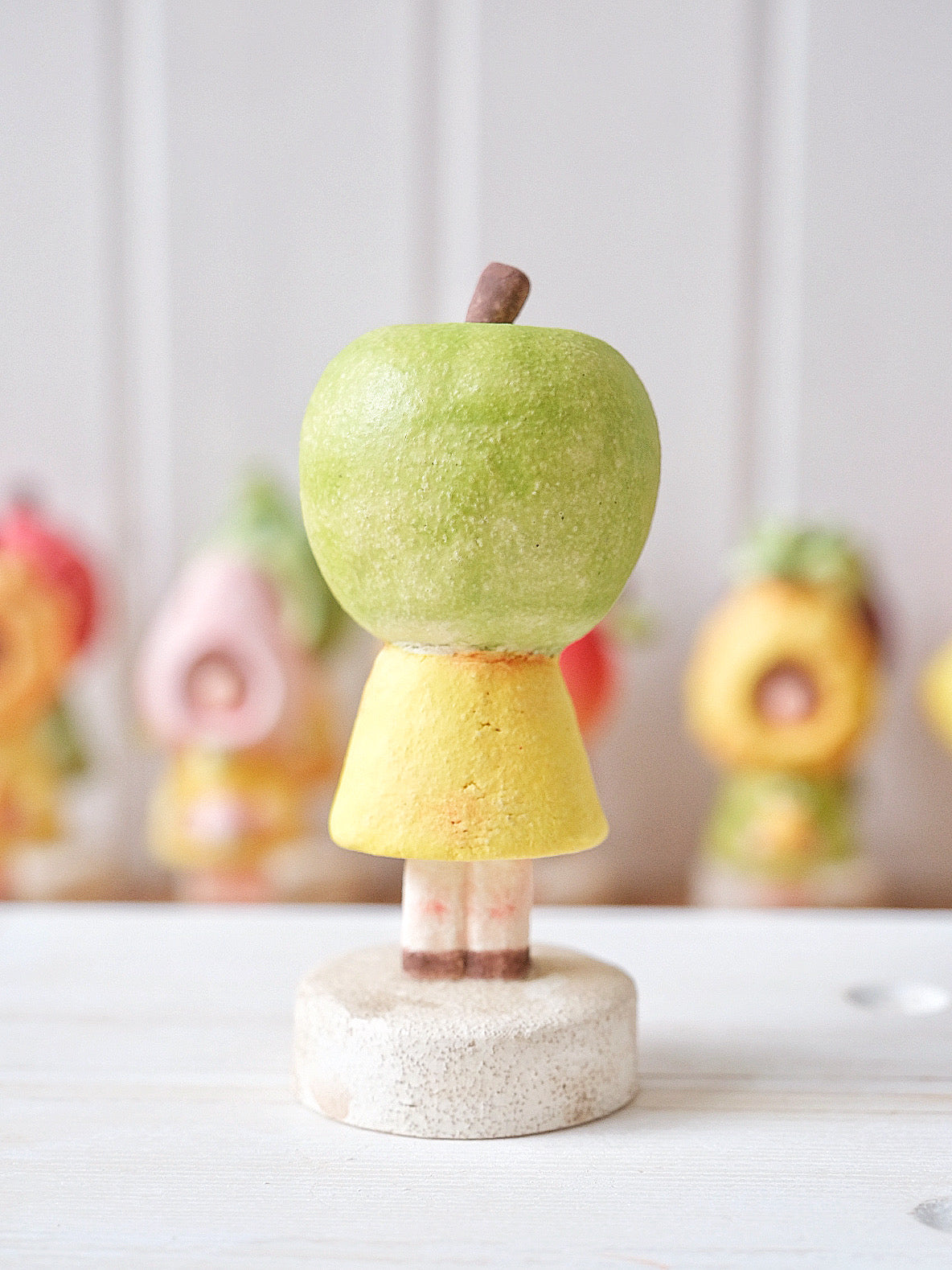 Ms. Apple in Green