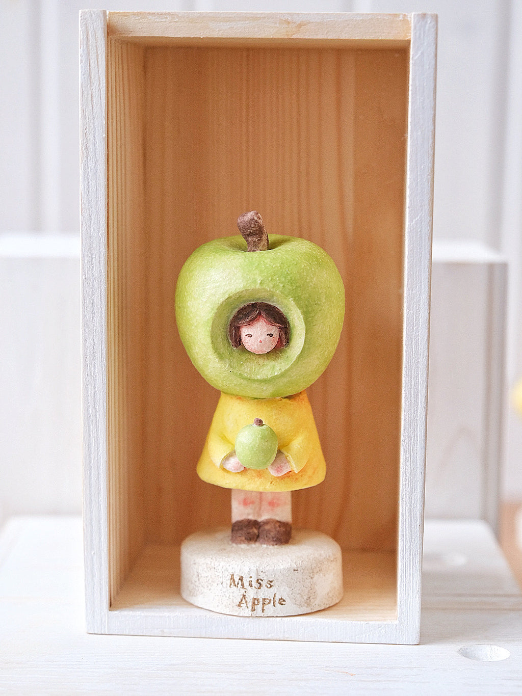 Ms. Apple in Green