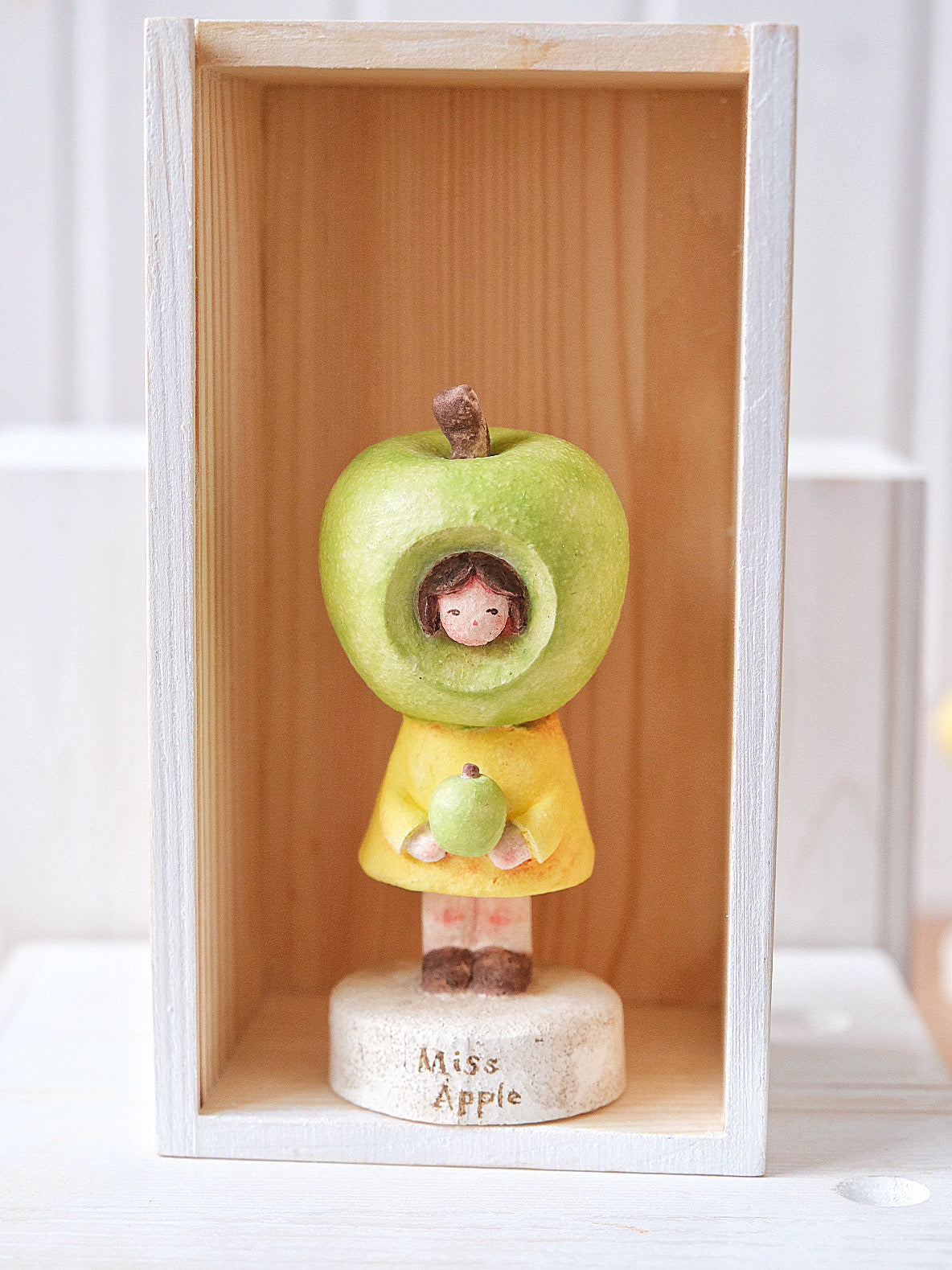 Ms. Apple in Green