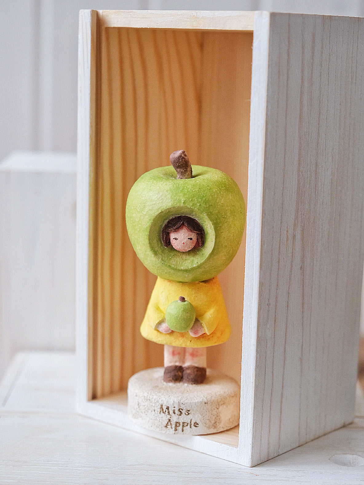Ms. Apple in Green
